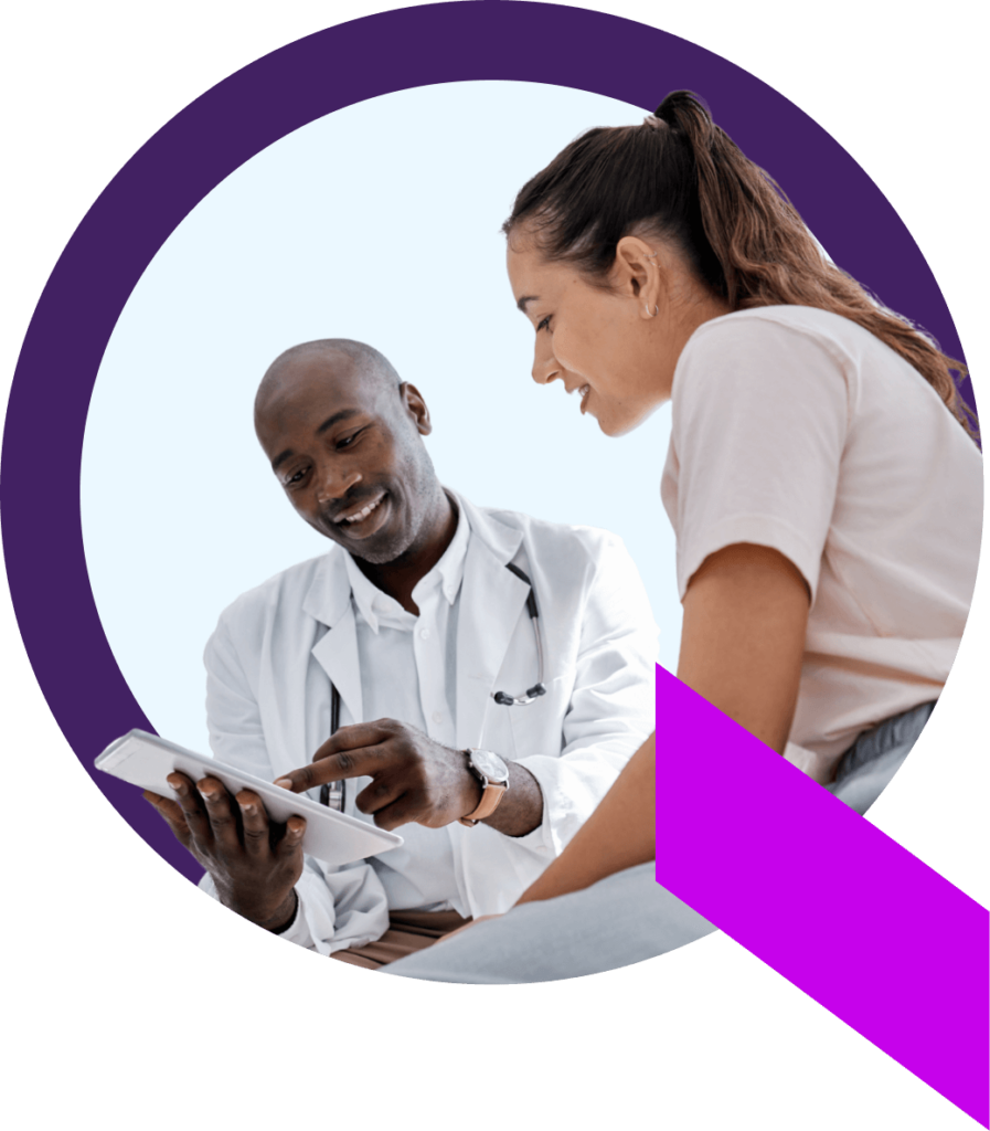 A healthcare system leader shows a patient important results on a tablet
