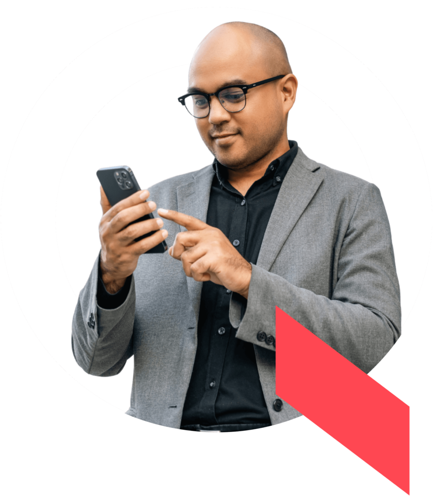A healthcare system leader reads the Qventus story on his mobile device