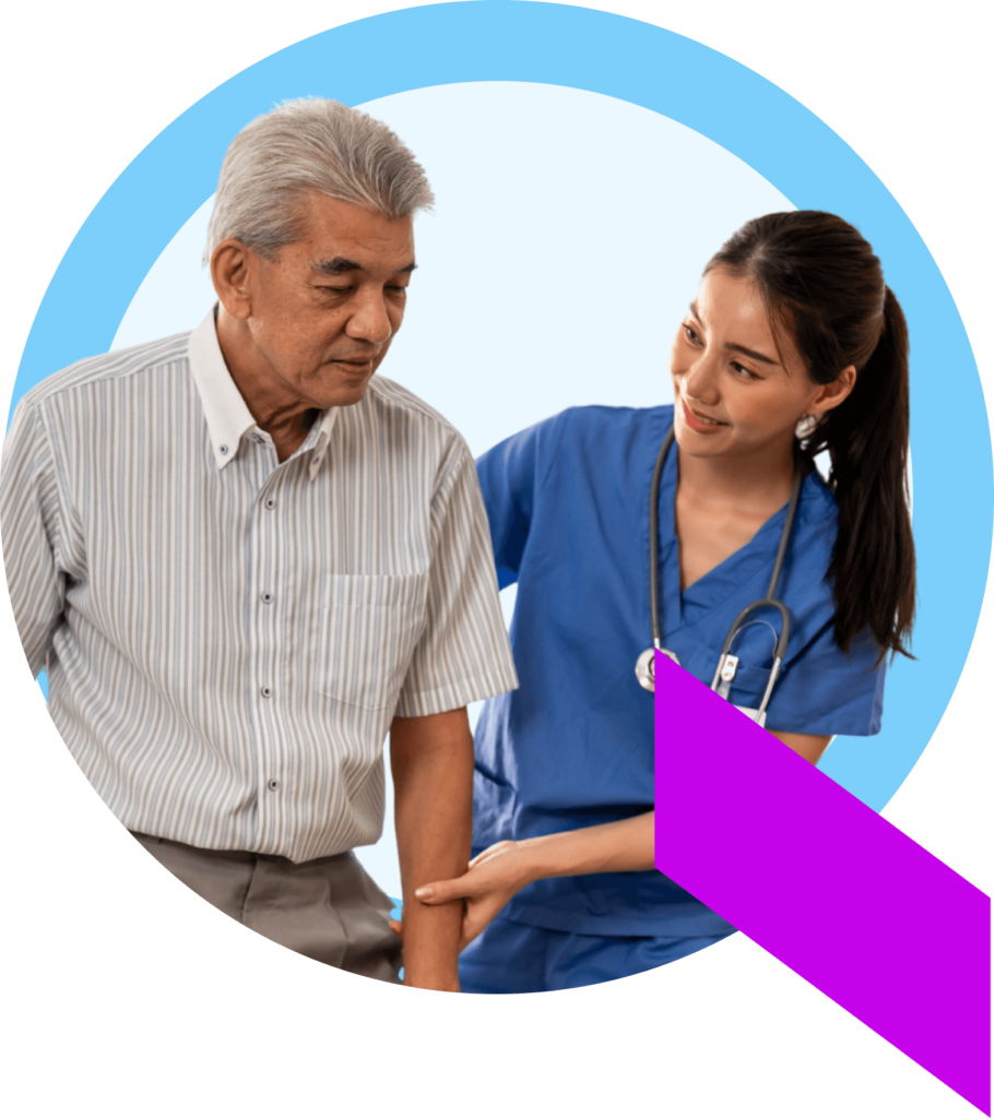 A healthcare professional in scrubs helping her patient successfully leave the hospital