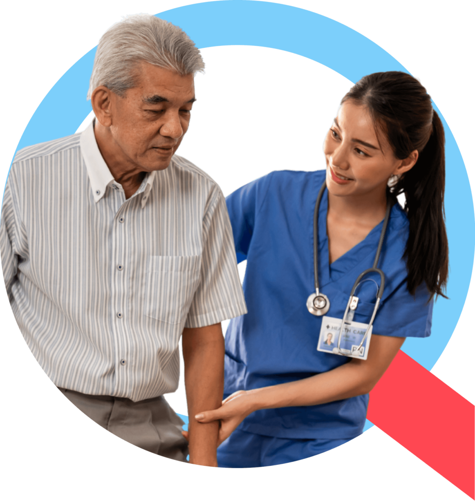 A healthcare professional in scrubs helping a patient walk through a hospital